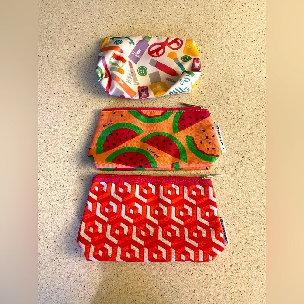 3 Women’s Clinique make up pouches